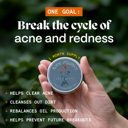 Hand holding Pimple Stopper Night Balm tin outdoors with graphic listing skin benefits